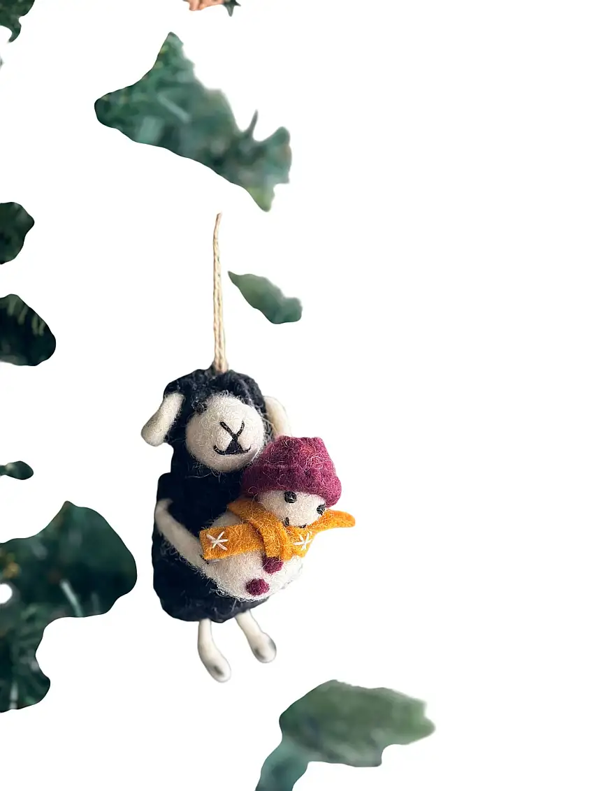 Black Sheep Holding Snowman Ornament
